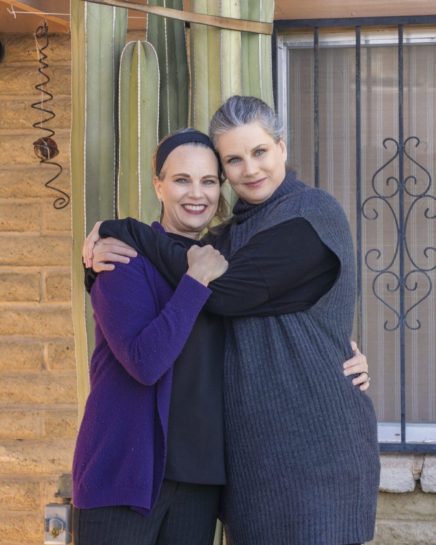 Two Slack family members share an embrace during the family photo session.