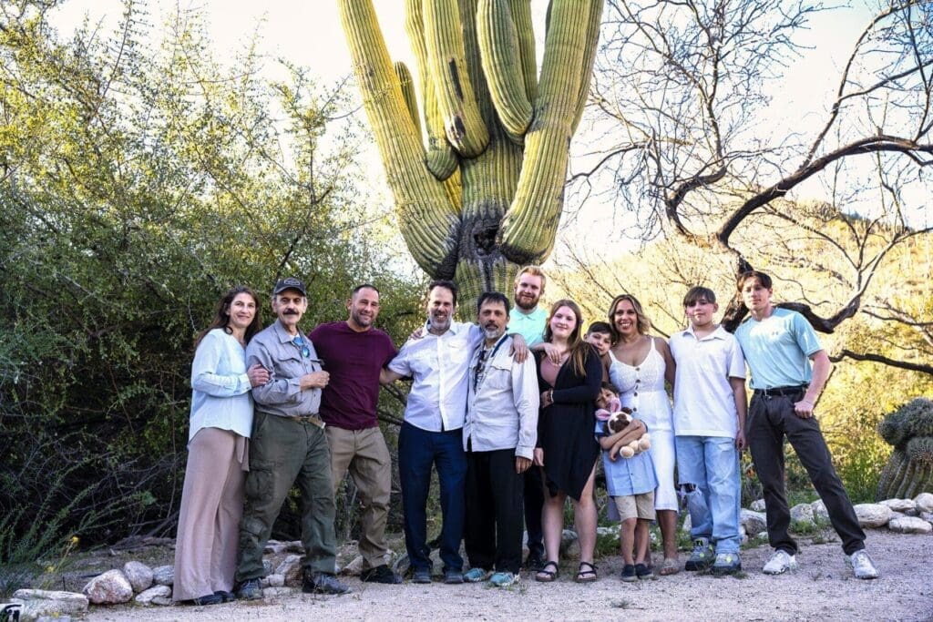 Gabrielle’s extended family poses together on a desert path at the Ritz-Carlton in Tucson.